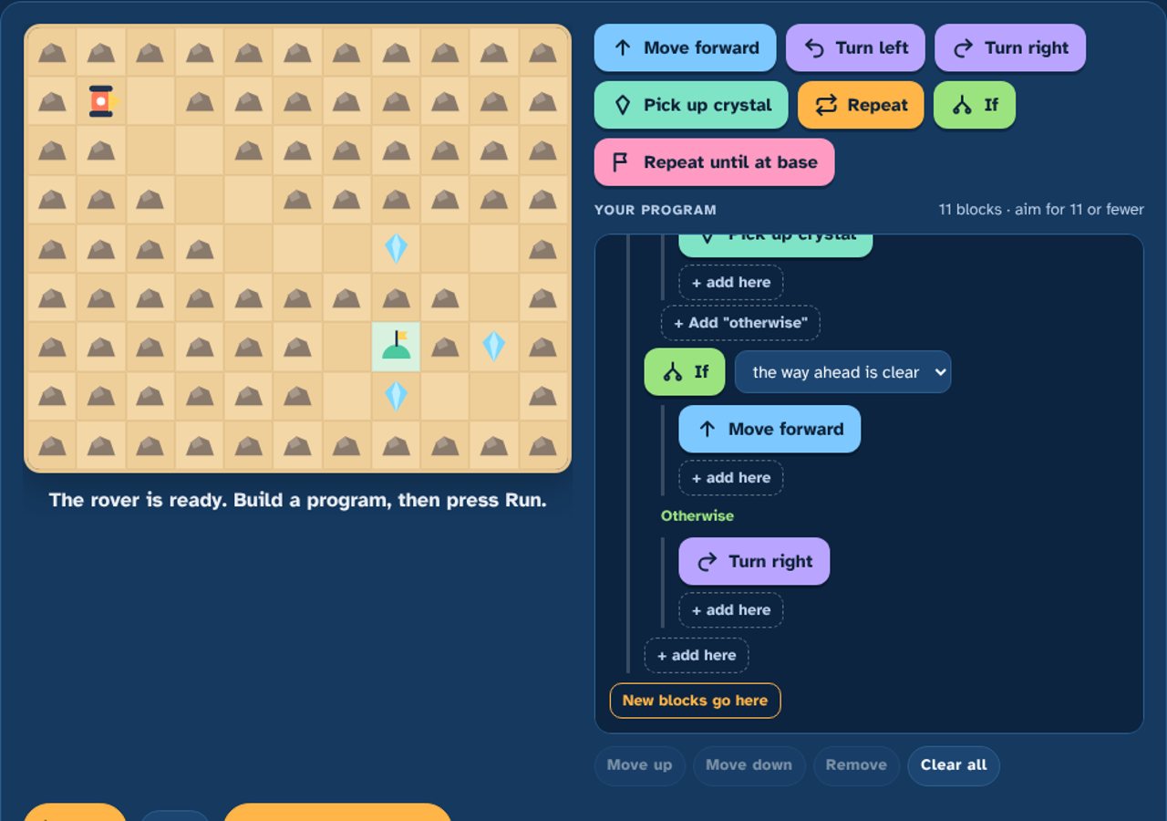An Explorers rover mission: a planet map with crystals and a base, and a program built from colourful blocks